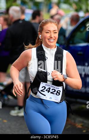 Belfast, Großbritannien. August 2025. 08/2025 Belfast 3000 Menschen haben heute am Feile 5k & 10k Run in West Belfast teilgenommen. Die Rains hielten an einem warmen, schwülen Morgen für die Runners ab. Quelle: Bonzo/Alamy Live News Stockfoto