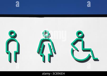 Symbol für Toilette und Toilette an der Wand Stockfoto