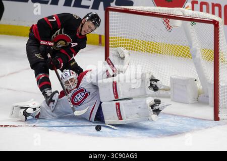 21. Februar 2021: Jake Allen (34), Torhüter der Montreal Canadiens, der im kanadischen Tire Centre im kanadischen Ottawa-Tire Centre eine Überstunde gegen die Ottawa Senatoren Brady Tkachuk (7) macht. Daniel Lea/CSM(Kreditbild: &Copy; Daniel Lea/CSM via ZUMA Wire) Stockfoto