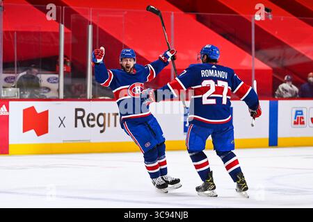 20. März 2021: Tomas Tatar (90) feiert sein Tor mit dem Verteidiger Alexander Romanov (27) während des Spiels Vancouver Canucks gegen Montreal Canadiens im Bell Centre in Montreal, Québec. David Kirouac/CSM(Credit Image: &Copy; David Kirouac/CSM via ZUMA Wire) Stockfoto