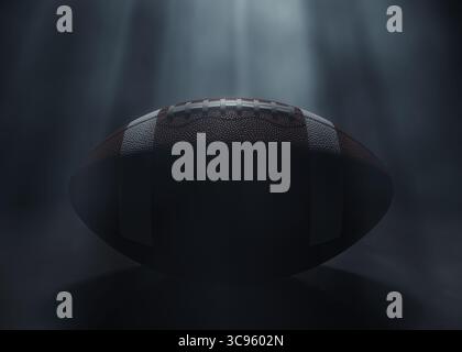 Ein american Football-Sportball, der von einem einzigen ätherischen Licht auf einem dunkelschwarzen Hintergrund beleuchtet wird – 3D-Rendering Stockfoto