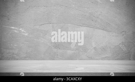 Leere graue Tischplatte aus Beton mit strukturiertem Wandhintergrund, die eine saubere, minimalistische Oberfläche bietet, ideal für Produktpräsentationen, Design-Mockups und moderne Modelle Stockfoto