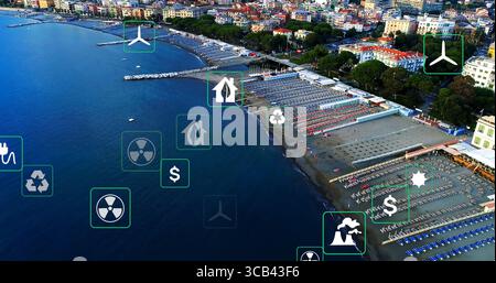 Aus der Vogelperspektive auf das Küstenresort mit geschwungener Bucht, Liegestühlen, Sonnenschirmen, Piers und überlagerten Ikonen Stockfoto