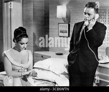 20. Februar 2023, Vereinigtes Königreich: Elizabeth Taylor, Richard Burton, am Set des britischen Films „The V.I.P.s“, MGM, 1963 (Bild: © JT Vintage Via ZUMA Press Wire) Stockfoto