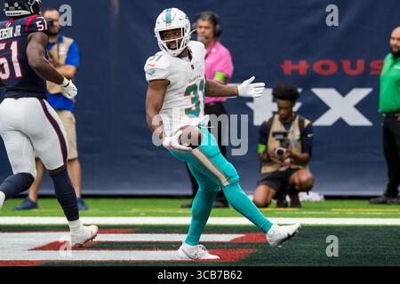 19. August 2023: Miami Dolphins Running Back Raheem Mostert (31) feiert einen rasanten Touchdown während eines Vorsaisonspiels zwischen den Miami Dolphins und den Houston Texans in Houston, Texas. ..Trask Smith/CSM (Foto: © Trask Smith/CSM via ZUMA Press Wire) Stockfoto