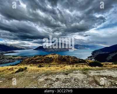 Rainbow über Queenstown Stockfoto