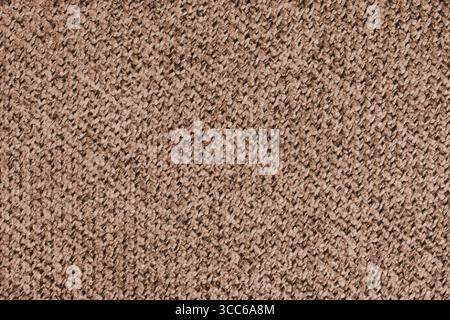 Makrofoto von braunem gewebtem Textilgewebe, Polstermaterial, Stoff mit detaillierter Textur und Muster. Perfekt für Textildesign, Hintergrund, Rückseite Stockfoto
