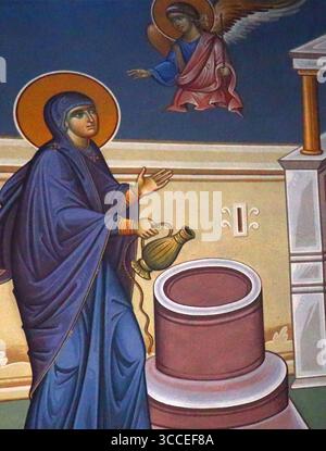 Ikone der Verkündigung von Engel Gabriel mit der Jungfrau Maria am Brunnen in der Himmelfahrt Mariens griechisch-orthodoxe Kirche Voula Griechenland Stockfoto