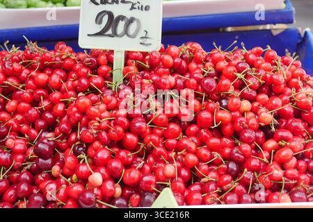 Fresh cherries displayed at a local market stall Stockfoto