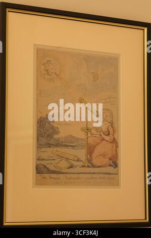 England, Somerset, Bath, Herschel Museum of Astronomy, Historical Magazine Cartoon mit Caroline Hershel Blick durch das Teleskop Stockfoto