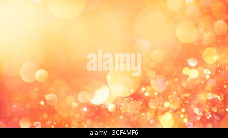 Funkelnder Glitzer in warmen Herbstfarben. Schimmernde Partikel, die unscharfkantig in einem unscharfen Bokeh aus roten, orangefarbenen und gelben Lichtern leuchten. Traumhaft verschwommenes A Stockfoto