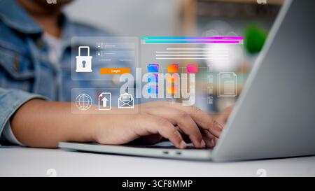 Datensicherheit und Cloud-Computing-Schnittstelle. Person, die einen Laptop mit einer futuristischen Oberfläche verwendet, die Datensicherheit, Cloud-Computing und digitale Dokumentation anzeigt Stockfoto
