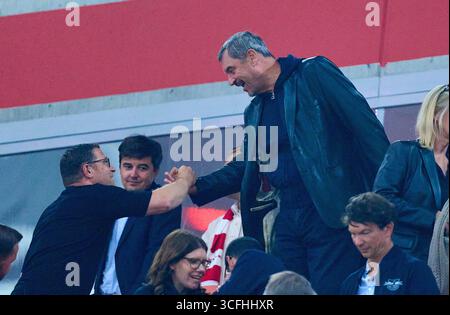 Markus Soeder, Söder, bayerischer Ministerpräsident, Ministerpräsident, Bayern, CSU, Politiker, Max Eberl, Sportdirektor des FC Bayern München, Sportvorstand und Manager FC Bayern, im Spiel FC BAYERN MÜNCHEN – RB LEIPZIG 6-0 am 22. August 2025 in der Allianz Arena München, Deutschland. Saison 2026/2026, 1.Bundesliga, FCB, Spieltag 1, 1.Spieltag Fotograf: Peter Schatz - DFL-VORSCHRIFTEN VERBIETEN JEDE VERWENDUNG VON FOTOGRAFIEN als BILDSEQUENZEN und/oder QUASI-VIDEO - Stockfoto