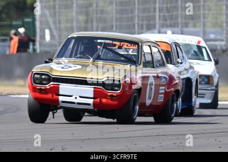 Silverstone Circuit, Northamptonshire, Großbritannien. 24. August 2025; Silverstone Circuit, Northamptonshire, England; Silverstone Festival Day 3 2025; MANN / SOPER in einem Ford Escort Mk1 während der Adrian Flux Trophy für MRL Historic Touring Car Challenge Stockfoto