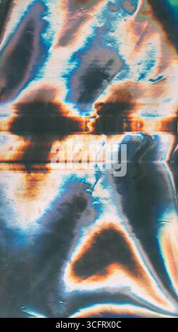 Gradientenundienten. Staub kratzt Geräusche. Farbige Folie mit reflektierender Textur. Fantasy Licht Flare Kurve Verzerrung Hintergrund. Stockfoto