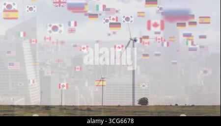 Große Windenergieanlage auf ländlichem Grasland mit Nationalflaggensymbolen Stockfoto