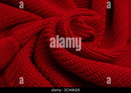 Rote Pullover-Textur als Hintergrund. Draufsicht Stockfoto