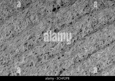 Haushalt Reinigung Schwämme schließen oben. Schwamm detail Textur, Schwamm Textur Nahaufnahme Hintergrund. Zelluloseschwamm Textur. Drahtgeflecht auf Schwamm Oberfläche Stockfoto