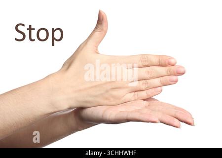 Frau, die das Wort Stop auf weißem Hintergrund zeigt, Nahaufnahme. Gebärdensprache Stockfoto