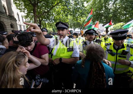 Pro-palästinensisches Protestnetzwerk der Palästinensischen Aktion demonstrierte in der City of Westminster London an dem Tag, an dem die Gruppe nach den Anti-Terror-Gesetzen verboten wurde. Stockfoto