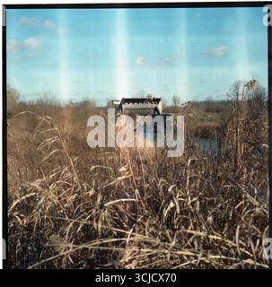 Alte Flussschleuse an einem Vojvodina-Fluss Stockfoto
