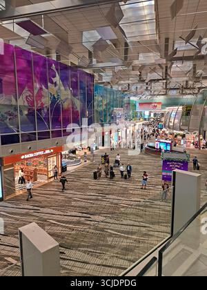Der internationale Flughafen Changi in Singapur ist einer der geschäftigsten Flughäfen Asiens und der siebtgrößte Flughafen der Welt. Es dient mehr als Stockfoto