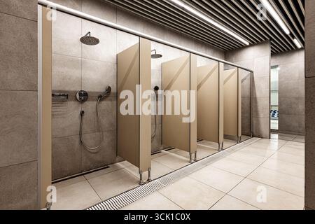 Ein eleganter Duschbereich mit beigefarbenen Trennwänden, modernen Armaturen und einer sauberen Fliesenoberfläche. Dieser geräumige Spind wurde für Effizienz und Komfort entwickelt Stockfoto