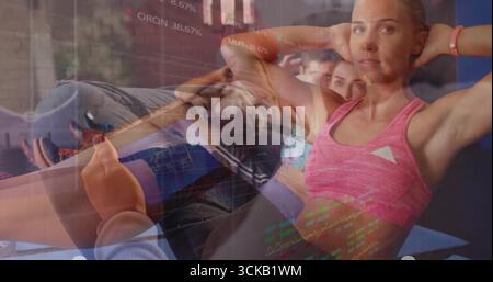 Frau mit rosa Sportbekleidung auf Yoga-Matten im Fitnessstudio mit Stock Chart-Overlay Stockfoto