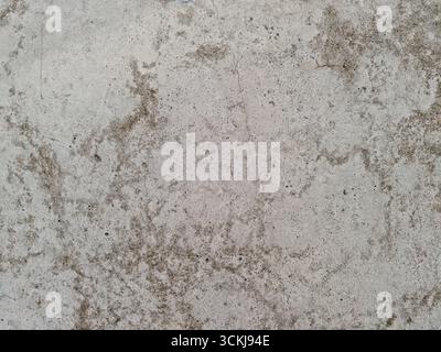 Nahaufnahme rauer Betonwände mit Flecken und verwitterter Textur. Hochwertige Fotos Stockfoto