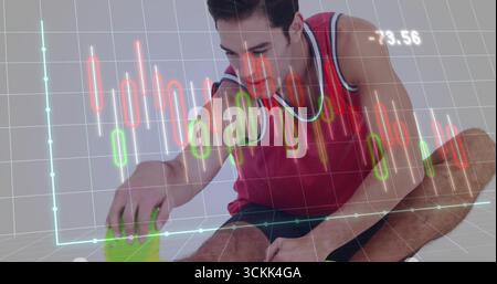 Stretchsportler, der im Studio nach Fuß greift, mit Schaumstoffblock und Kerzendiagramm-Overlay Stockfoto