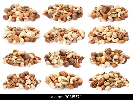 Nüsse mischen sich in Haufen isoliert auf weiß, Set Stockfoto