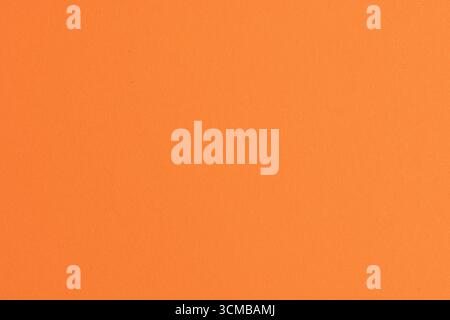 Orangefarbener Hintergrund mit Papierstruktur. Hochwertige Textur Stockfoto