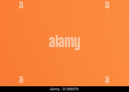 Orangefarbener Hintergrund mit Papierstruktur. Hochwertige Textur Stockfoto