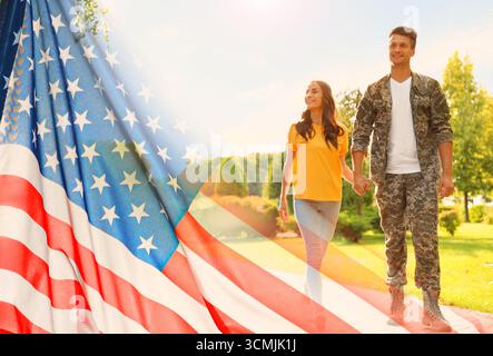 Militärmann und seine Freundin draußen, doppelte Exposition mit Nationalflagge der USA Stockfoto