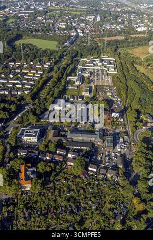Luftansicht, Gewerbegebiet Wilhelmstraße mit gewundenem Turm der ehemaligen Zeche Pluto und Gefängnis Herne im Stadtteil Wanne von Herne, Ruhr AR Stockfoto