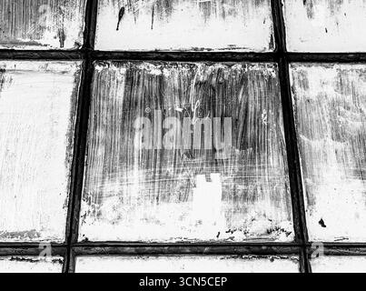 Veraltete Quadratische Fensterrahmen – Verwitterte Farbe Und Textur. Einfarbige Farbtöne. Stockfoto