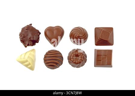 Eine Reihe von Schokoladenbonbons in verschiedenen Formen und Größen. Die Süßigkeiten sind in einer Reihe angeordnet, wobei einige größer sind als andere. Die Vielfalt der Shap Stockfoto