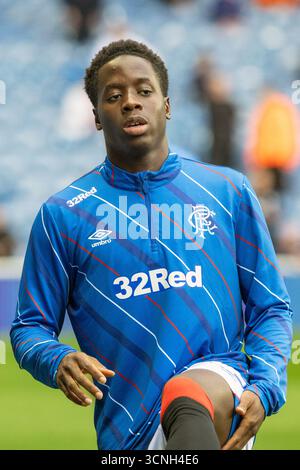 Djeidi Gassama, professioneller Fußballspieler, spielt derzeit für den Rangers FC. Bild, das während einer Aufwärmphase vor dem Spiel und einer Trainingssitzung aufgenommen wurde. Stockfoto