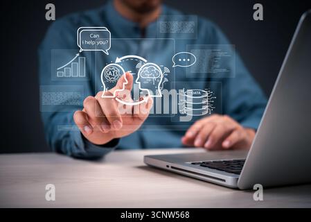 Futuristisches KI-Assistenten-Konzept mit Symbolen für digitales Gehirn, Chatbot und Datenspeicherung. Geschäftsmann interagiert mit intelligenter Schnittstelle und repräsentiert Innovati Stockfoto