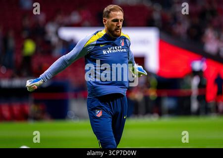 Madrid, Madrid, Spanien. September 2025. Jan Oblak von Atletico de Madrid wärmt sich während des LaLiga EA Sports Fußball-Spiels zwischen Atletico de Madrid und Rayo Vallecano am 24. September 2025 in Madrid auf. (Kreditbild: © Alberto Gardin/ZUMA Press Wire) NUR REDAKTIONELLE VERWENDUNG! Nicht für kommerzielle ZWECKE! Stockfoto