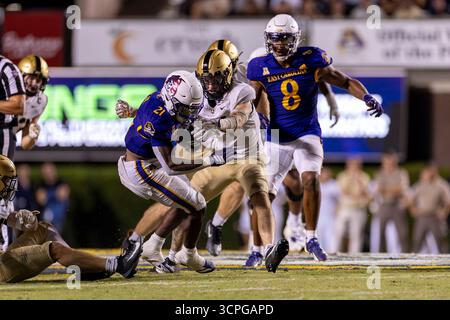 Greenville, North Carolina, USA. September 2025. East Carolina Pirates laufen zurück MARLON GUNN JR. (21) spielt den Ball während des American Athletic Conference (AAC) Fußballspiels zwischen den Army Black Knights und East Carolina University (ECU) Pirates am 25. September 2025 im Dowdy-Ficklen Stadium in Greenville, NC. ECU besiegte Armee 28 - 6. (Kreditbild: © Israel Anta via ZUMA Press Wire) NUR REDAKTIONELLE VERWENDUNG! Nicht für kommerzielle ZWECKE! Stockfoto