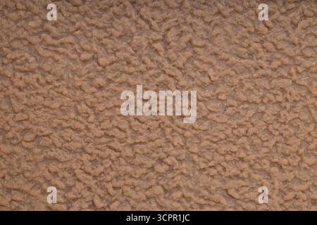 Beige Fleece Wollstruktur Nahaufnahme Stockfoto
