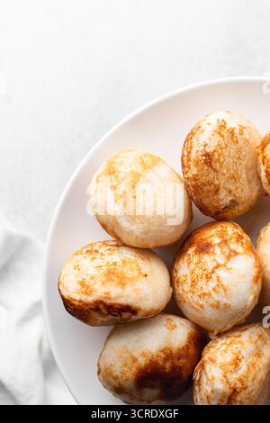 Blick von oben auf Masa, Blick von oben auf das Essen vom nördlichen nigeria Masa Reis Kuchen Stockfoto