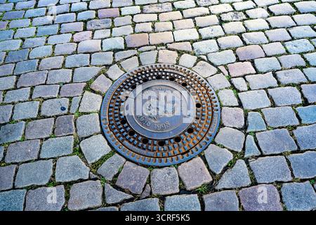 350 Jahre Westfälischen Frieden auf einem Mannlochdeckel in Münster-Westfalen. Nordrhein-Westfalen, Deutschland Stockfoto
