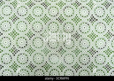 Weißer Blumenstoff aus Baumwollfäden, strukturierter Hintergrund Stockfoto