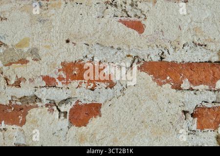 Alter Verwitterter Grunge-Ziegelstein-Wand-Aufgerissener Textur-Hintergrund Stockfoto