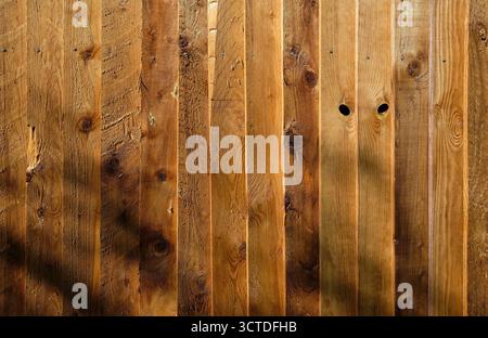 Hintergrund mit Buntholz-Gartenzaun Stockfoto