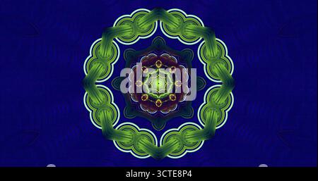 Dieses lebhafte Mandala bietet eine Mischung aus Grün und Violett vor dunklem Hintergrund und zeigt ein kompliziertes Design aus Formen und Kurven Stockfoto