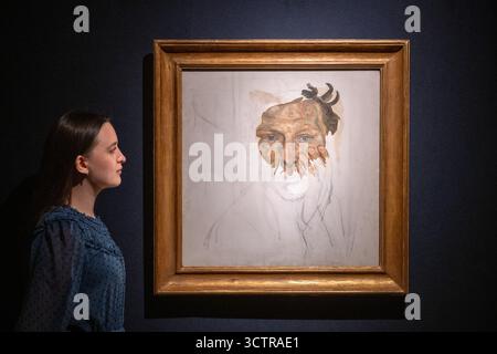 London, England, Großbritannien. Oktober 2025. A Christie's Staff steht neben Self-Portrait Fragment (1956) von Lucian Freud während einer Pressevorschau bei Christie's in London, Großbritannien, am 8. Oktober 2025. Das Gemälde wird voraussichtlich für 8 bis 12 Millionen GBP verkauft, und zwar im 20./21. Jahrhundert: London Evening Sale. (Kreditbild: © Thomas Krych/ZUMA Press Wire) NUR REDAKTIONELLE VERWENDUNG! Nicht für kommerzielle ZWECKE! Stockfoto