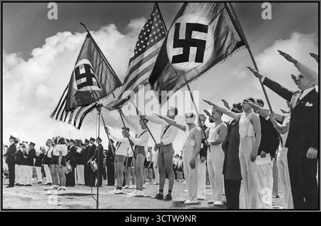 Die Rallye des Deutschen Deutschen Amerikanischen Bundes fand im Juli 1937 im Camp Nordland in Andover, New Jersey, statt. Die Kundgebung zeigt Menschen, die einen Nazi-Gruß zu einer Parade von Fahnen geben, die sowohl die amerikanische Flagge als auch die Flagge von Nazi-Deutschland umfasst. Der German American Bund war eine pro-Nazi-Organisation in den Vereinigten Staaten, die in den 1930er Jahren aktiv war Die Gruppe hielt Kundgebungen ab und förderte die Ideologie des Nazi-Deutschlands, wobei sie oft versuchte, sich als patriotische amerikanische Organisation darzustellen. Die Kundgebungen wurden oft als pro-'Amerikanismus'-Veranstaltungen bezeichnet und enthielten amerikanische und Hakenkreuzflaggen Stockfoto